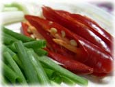food preparation : chopped spring onions + chilies